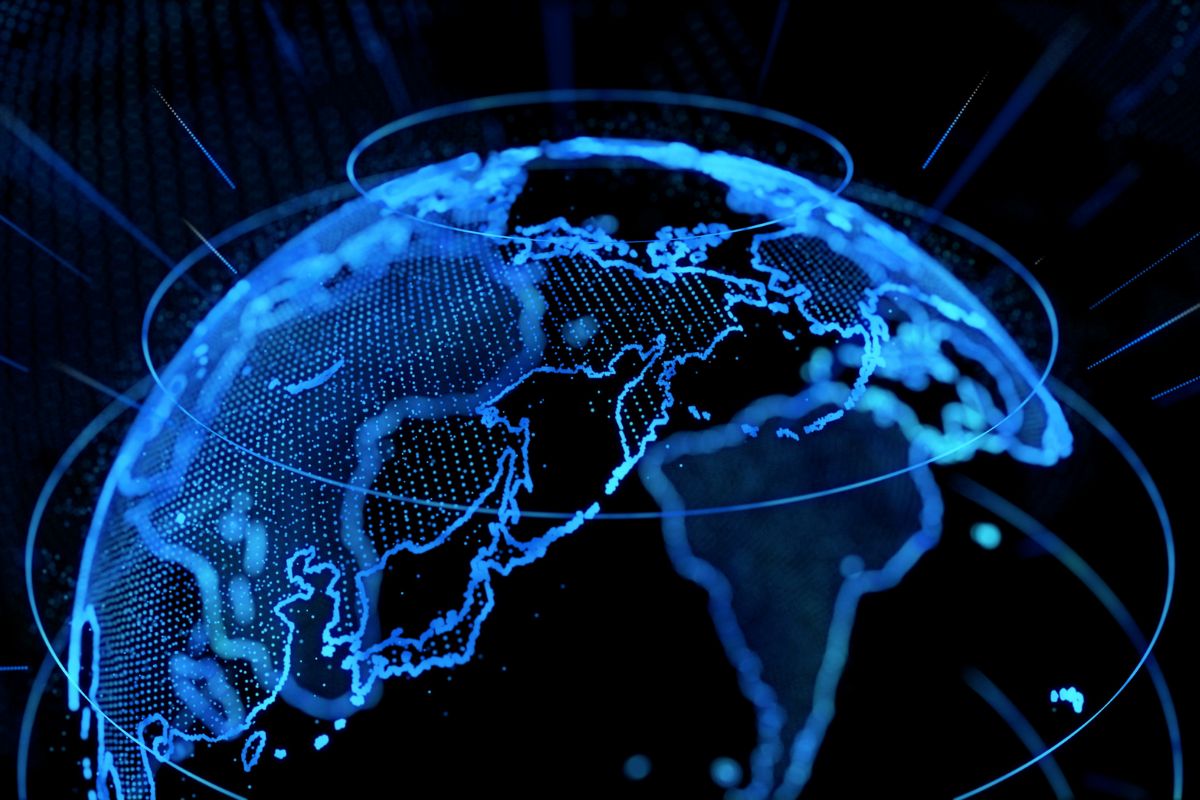 A glowing digital globe made of connected points of light